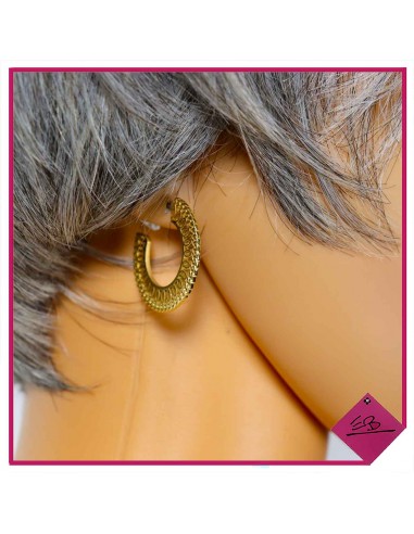 Boucles d'oreilles en acier doré, frise à motifs